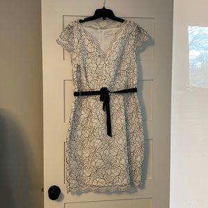 Calvin Klein dress. White lace overlay with ribbon tie, never worn